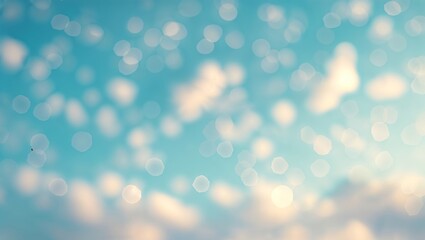 Soft clouds drift in a bright blue sky creating a peaceful, tranquil atmosphere on a sunny day