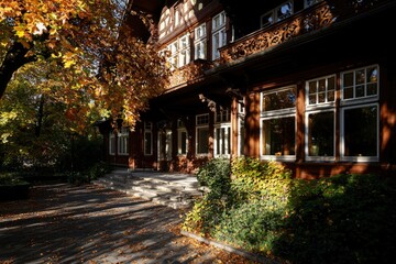 Fototapeta premium Autumnal Elegance in a Wooden Building