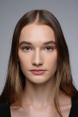 Naklejka premium Studio Portrait of Woman with Natural Makeup 