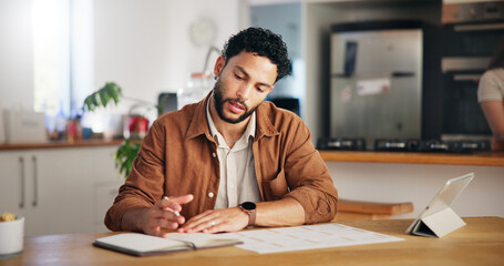 Man, notebook and calendar planning in home with tablet agenda, meeting deadline and time management. Remote work, entrepreneur and schedule for tasks reminder, appointment date and notes planner.