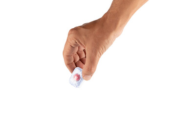 Male hand placing a dishwasher tablet isolated no background cut out