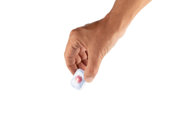 Male hand placing a dishwasher tablet isolated no background cut out