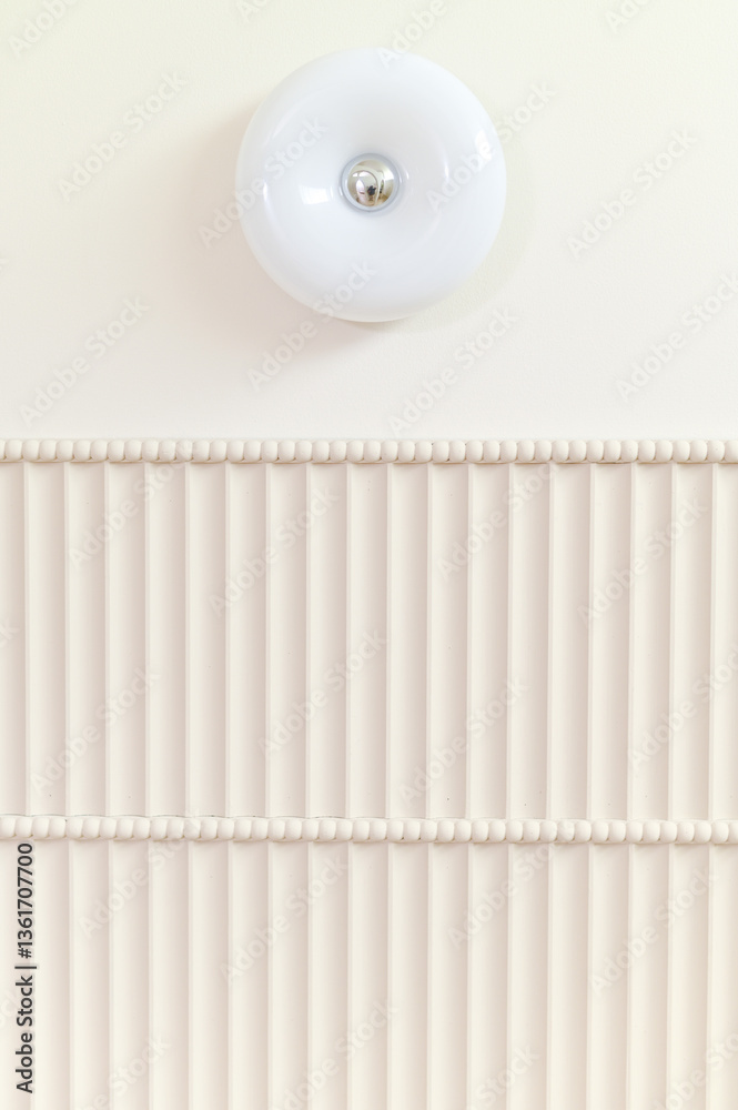 Poster Minimalist white ceiling with round light fixture and textured linear design, creating clean and modern aesthetic