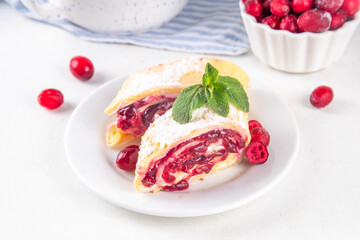 Cranberry strudel, winter roll dessert with cranberry jam