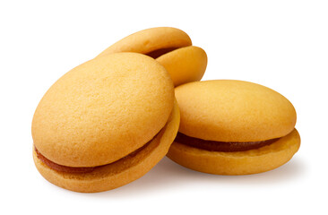 Round sandwich cookies with cream on a white background. Biscuits isolated