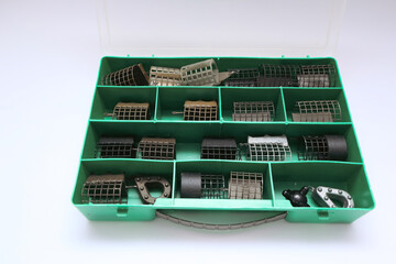 Close-up of different fishing tackle. fishing tackle on a white