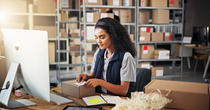 Woman, label and box for warehouse distribution of packaging, inventory management and receipt. Person, computer and parcel with sticker of payment invoice, quality assurance and shipping information