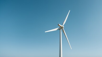 Renewable Energy Rises: A Single Wind Turbine Towering Against a Vast Blue Sky, Symbolizing Sustainable Power Generation and Environmental Consciousness.