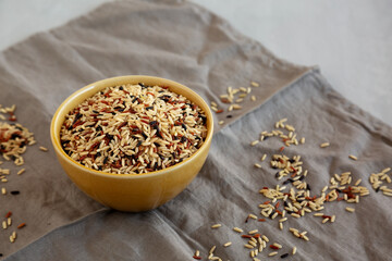 Organic Dry Asian Wild Rice in a Bowl, side view.