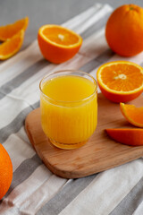 Organic Orange Juice in a Glass, side view.