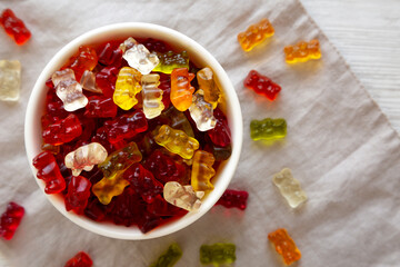 Colorful Gummy Bears in a Bowl, top view. Flat lay, overhead, from above.