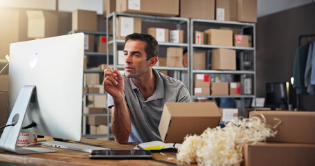 Box, computer and supply chain with man in distribution center for inventory checklist or update. Logistics, reading and schedule with employee in office for delivery, ecommerce or shipping manifest