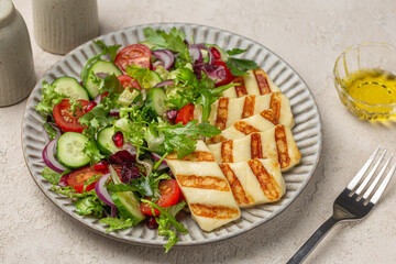 fried halloumi cheese with fresh vegetable  salad