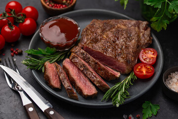 sliced grilled medium rare ribeye steak