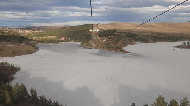 Dolly View in Gondola, Enjoying Winter Time on Tornik with Beautiful Orange Landscape