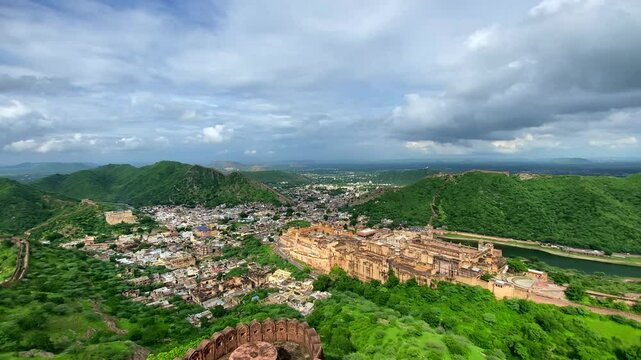 The view from Jaigarh Fort overlooks Amer Fort in Jaipur, the capital of Rajasthan, India, offering a stunning panorama of its historic architecture and surrounding landscapes.