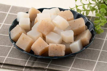 Raw konjac in square shape, also named konnyaku in Japan.