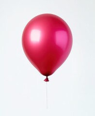 Bright pink balloon floats against a minimalist background, showcasing its glossy surface and vibrant color for celebrations or events
