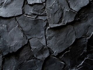 Dark, textured stone wall background