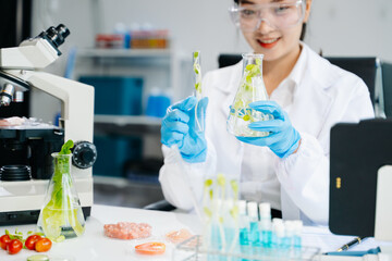 Food scientists in lab coats, testing samples, and analyzing food safety and quality in a laboratory