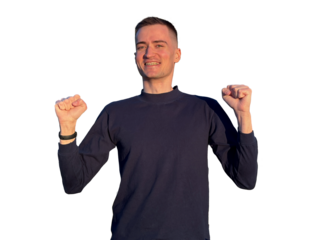 Happy man celebrating with arms up