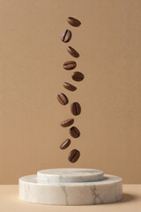 Floating Coffee Beans on Marble Podium