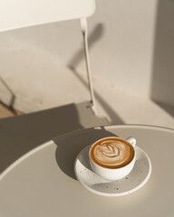 Morning Latte Art on a Sunlit Table