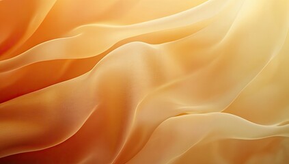 Obraz premium Soft, flowing, amber fabric drapes in sunlight