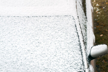 Winter frost and snow blocking windshield view