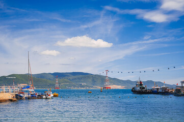 Fototapeta premium A landscape with Vietnamese boats in the sea and a view of the island of Vinperl.