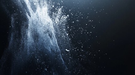 Silhouette of a black cat sitting in front of a vibrant sunset over the ocean