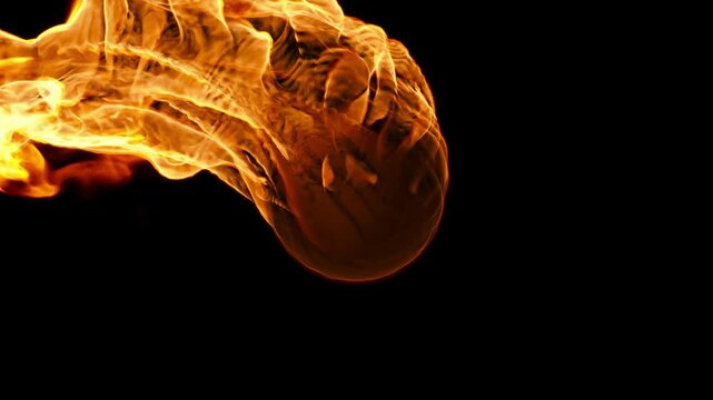Flaming matter in motion. Close-up of a sphere of fire in the air.