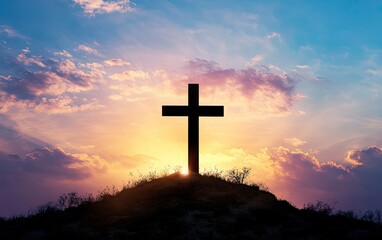 Silhouette of Christian Cross on Hill with Dramatic Sunset Sky