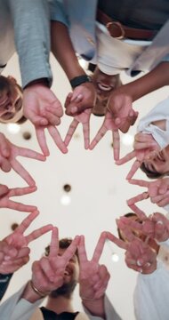 Peace sign, below and hands of business people in office for teamwork, collaboration and partnership. Low angle, corporate diversity and men and women in circle for connection, support and solidarity