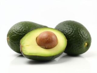 Avocado Delight: Fresh, whole avocados and a sliced one revealing the seed. A delicious, healthy ingredient.