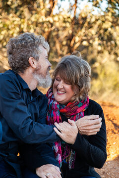 Husband kissing wife