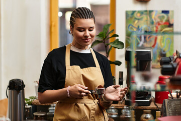 Charming barista creating the perfect coffee experience at a cozy cafe