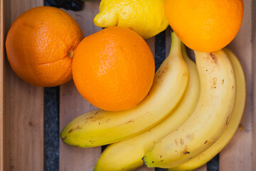 Fresh fruits in a wooden crate inviting a vibrant taste experience