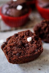 Homemade hot chocolate muffins with mini marshmallows, selective focus