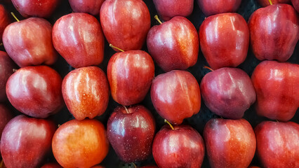 Fresh ripe red apples as background