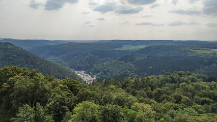 Panoramic view overlooking lush forests and rolling hills from konigstein fortress, saxony, germany