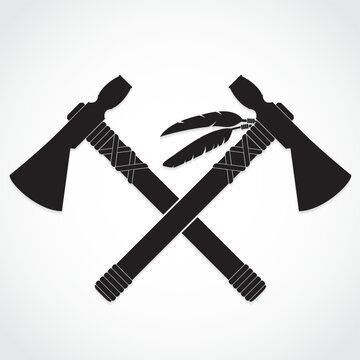 two silhouette crossed tomahawk axes symbol