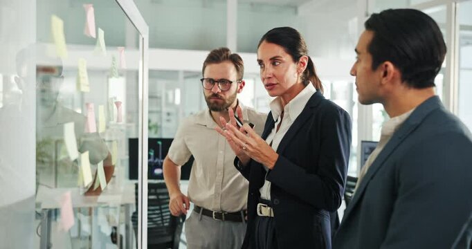 People, woman leader and sticky note on window for planning, strategy and brainstorming in workshop. Female speaker, presentation or group training in office for idea, collaboration or FAQ feedback