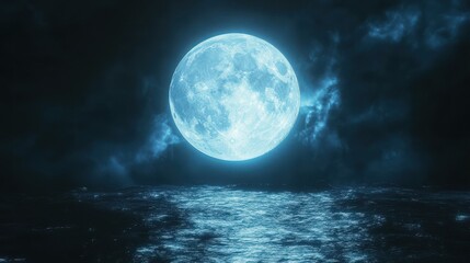 High resolution images A full moon glowing blue against the black sky, perfect for creating an enchanting and mysterious atmosphere in your images or video backgrounds. The bright light of the Moon