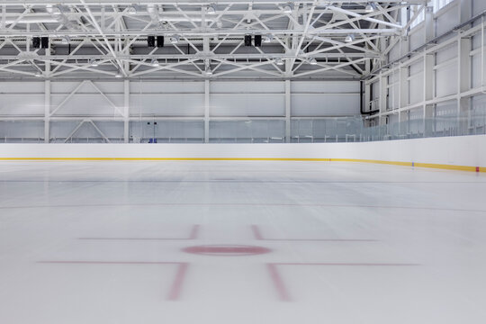 Interior view of an ice rink with ice hockey markings