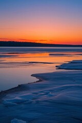 Obraz premium arafed view of a lake with ice and a sunset in the background