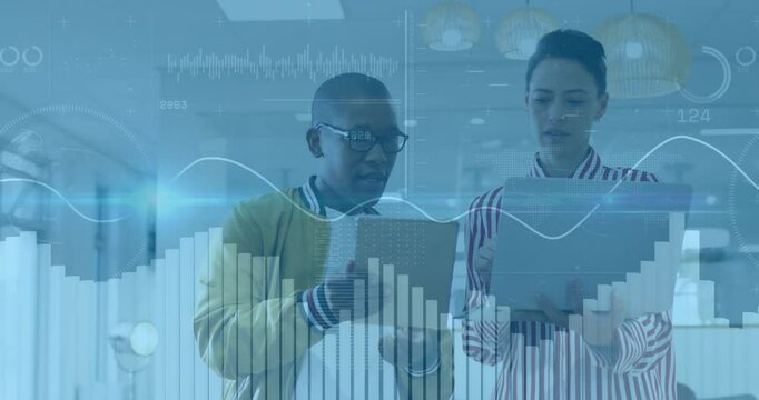 Discussing financial graphs, two people using tablets with animation in school