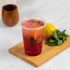 Refreshing Summer Strawberry Mojtio Cocktail with Lemon, Mint and Ice