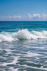 Obraz premium surfers are riding the waves in the ocean on a sunny day