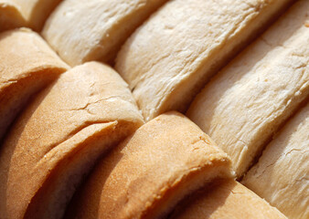 Fresh brown bread Top view, texture of fragrant bread background with brown bread edges macro food